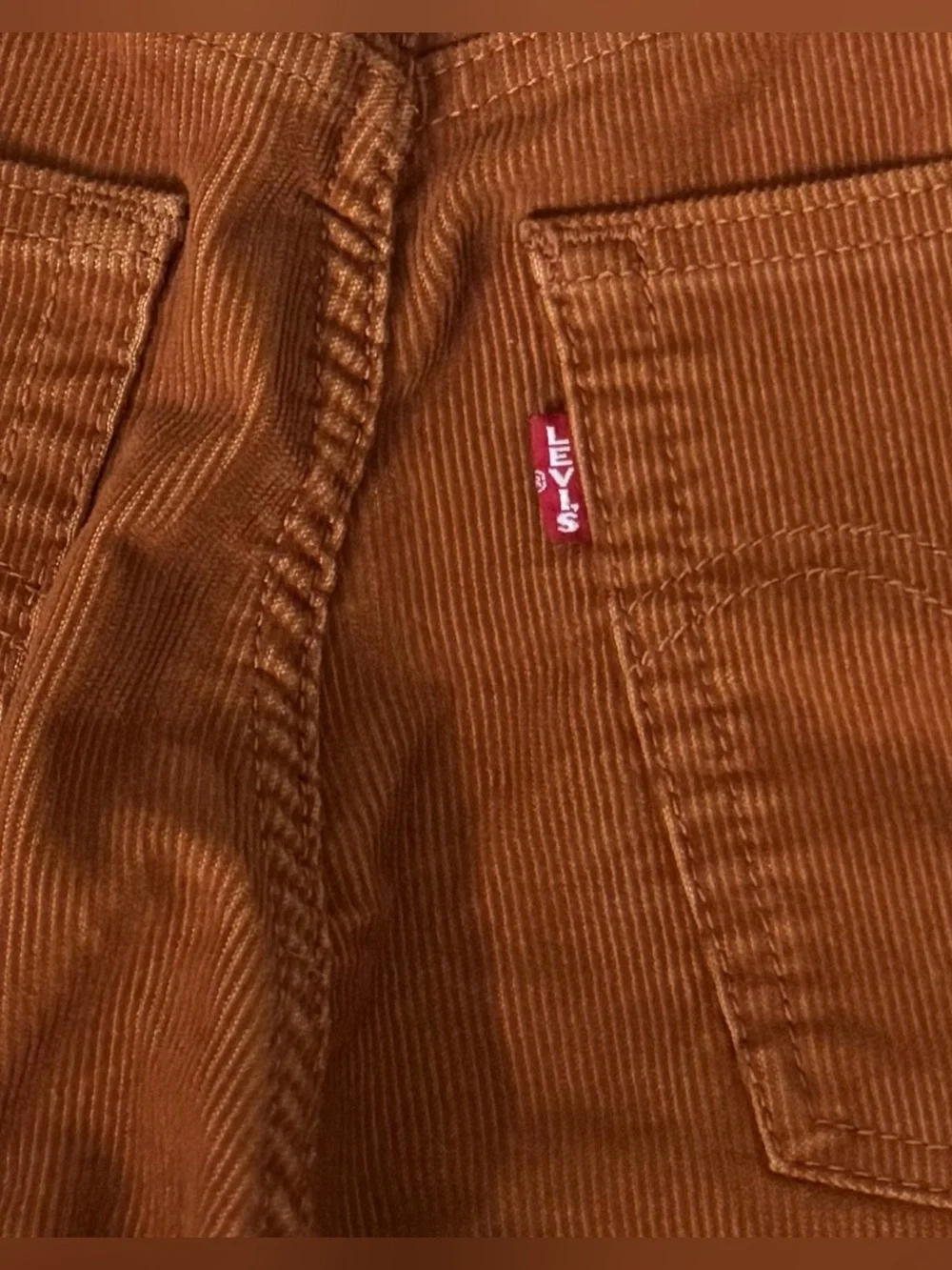 Levi’s Women’s Ribcage Flare Rust Orange Corduroy High Rise Pants Size 28